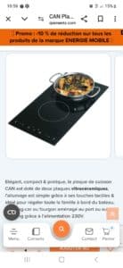 Plaque vitrocéramique noire avec marmite de fruits de mer