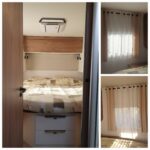 Intérieur moderne de caravane avec lit et fenêtres
