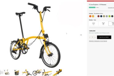 Vélo pliant jaune sur fond blanc