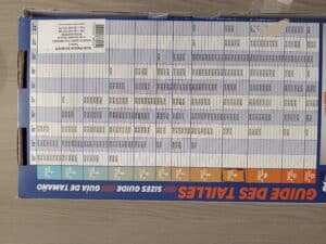 Guide des tailles de vêtements affiché horizontalement.